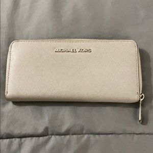 Michael Kors gray zip around wallet